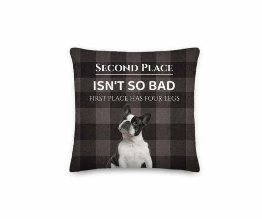 Decorative pillow with a dog illustration and humorous text on a checkered background