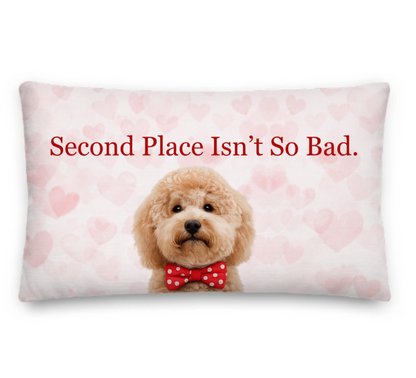 Decorative pillow with a dog wearing a bow tie and text 'Second Place Isn't So Bad' on a heart-patterned background.