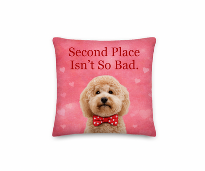 Pillow with a dog illustration and text 'Second Place Isn't So Bad.' on a pink background