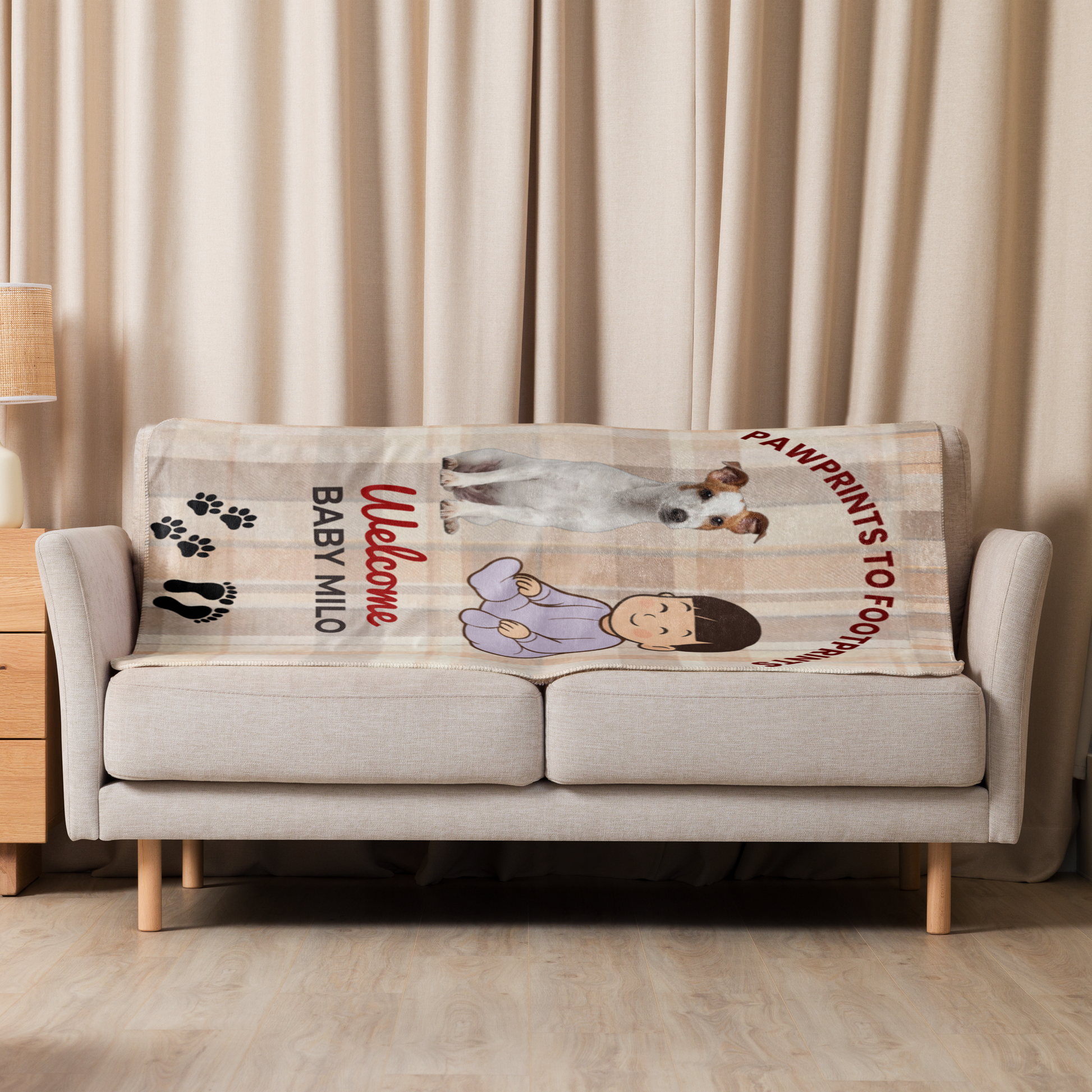 Personalized baby blanket with illustrations of a baby and a dog on a sofa in a living room.
