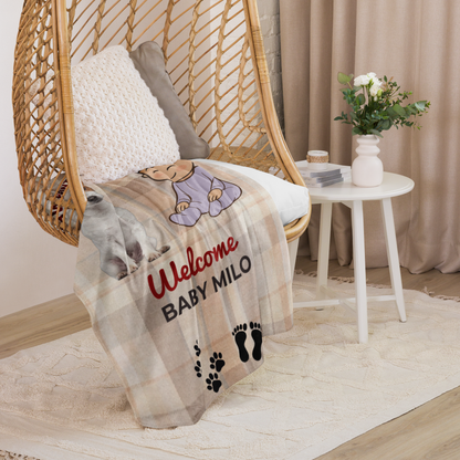 Woven chair with a personalized baby blanket draped over it, set in a cozy room.