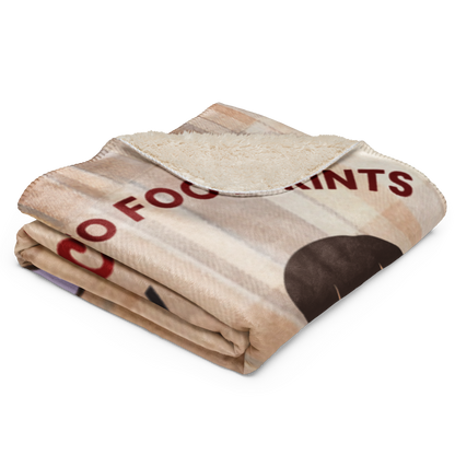 Folded blanket with visible text on a white background