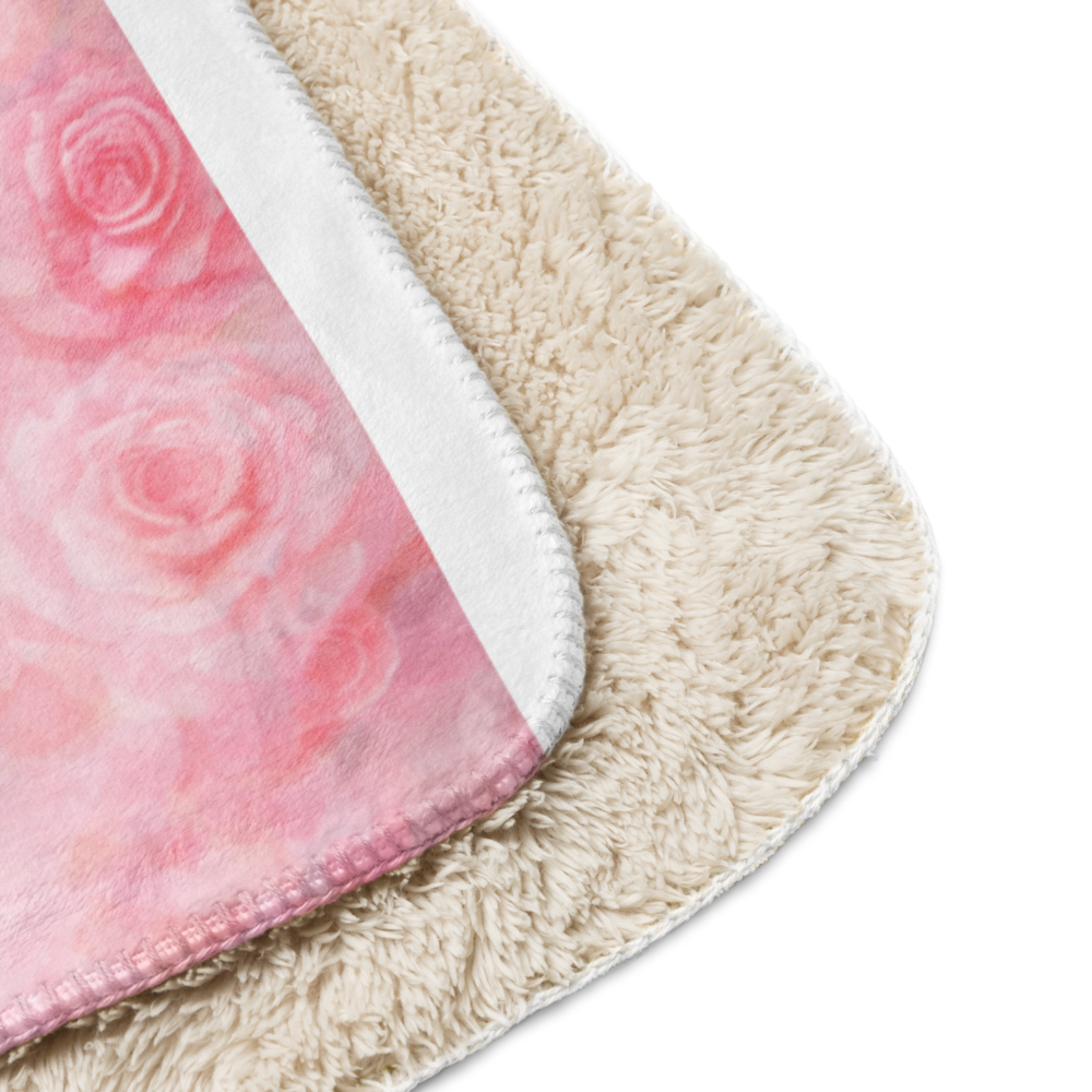 Close-up of a pink floral rug with beige border on a white background